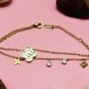 Layered floral Bracelet with charms