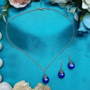 Silver-Toned Blue Pendant And Earring Set