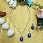Silver-Toned Blue Pendant And Earring Set