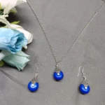 Silver-Toned Blue Pendant And Earring Set