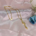 Curved AD Gold-Tone Drop Pendant