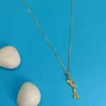 Curved AD Gold-Tone Drop Pendant