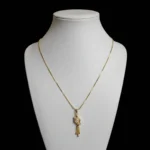 Curved AD Gold-Tone Drop Pendant