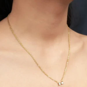 Graceful CZ Gold-Tone Bow Pendant