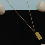 Graceful Gold-Tone Envelope Pendant