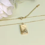 Graceful Gold-Tone Envelope Pendant